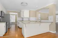 4204 Fairhaven Drive, Rocky Mount, NC 27803 — 4-bedroom home in Fairfield, Rocky Mount, NC, photo 12 of 30: Kitchen with open pass-through