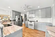 906 Jewell Court, New Bern, NC 28560 — 4-bedroom waterfront home in Fairfield Harbour, New Bern, NC, photo 15 of 52: Leathered granite counters