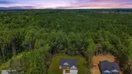 2000 Hayes Road, Spring Hope, NC 27882 — 3-bedroom home, Spring Hope, NC, photo 2 of 43: 07-DJI_20260826131238_0850_D - ok