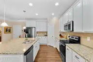 418 Goldenleaf Circle, Whispering Pines, NC 28327 — 4-bedroom home in Summerfield at Arrowstone, Whispering Pines, NC, photo 16 of 47: kitchen