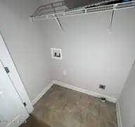 1320 Thomas Langston Road 2, Winterville, NC 28590 — 2-bedroom townhome in Legends, Winterville, NC, photo 6 of 10: Laundry area
