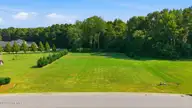5818 Nobleman Court, Elm City, NC 27822 — lot in Copperberry, Elm City, NC, photo 5 of 12: 14-web-or-mls-dji_fly_20260818_095926_02