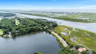 621 Lakeshore Drive, Sunset Beach, NC 28468 — waterfront lot in Twin Lakes, Sunset Beach, NC, photo 11 of 14