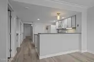 10300 Coast Guard Road D211, Emerald Isle, NC 28594 — 3-bedroom waterfront condo in Point Emerald Villas, Emerald Isle, NC, photo 18 of 54: Dining to Kitchen