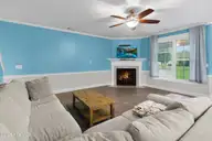 405 Antioch Lakes Road, New Bern, NC 28560 — 3-bedroom waterfront home in The Lakes at Antioch, New Bern, NC, photo 16 of 54: Living room