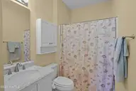 5057 Wyncie Wynd, Southport, NC 28461 — 2-bedroom townhome in South Harbour Village, Southport, NC, photo 20 of 53: 21-Primary Bathroom