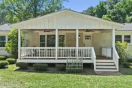 13290 New Britton Highway E, Nakina, NC 28455 — 3-bedroom home, Nakina, NC, photo 9 of 74: Expansive Front Porch