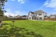 166 Camden Trail, Hampstead, NC 28443 — 4-bedroom waterfront home in Camden, Hampstead, NC, photo 16 of 41: The Backyard view!