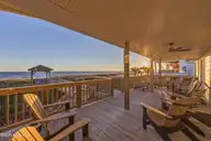 5419 W Beach Drive, Oak Island, NC 28465 — 7-bedroom waterfront home, Oak Island, NC, photo 11 of 69: 93_deck