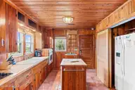 411 S Anderson Boulevard, Topsail Beach, NC 28445 — 3-bedroom waterfront home in Topsail Inlet Terrace, Topsail Beach, NC, photo 13 of 53: 011_411_s_anderson_blvd-11_940