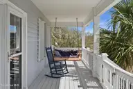 5 Osprey Circle, North Topsail Beach, NC 28460 — 3-bedroom waterfront home in Crystal Shores, North Topsail Beach, NC, photo 7 of 79: 9_porch