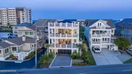 110 Waynick Boulevard, Wrightsville Beach, NC 28480 — 4-bedroom waterfront home, Wrightsville Beach, NC, photo 5 of 77: 001_dji_20260504200027_0519_d-hdr_copy_5