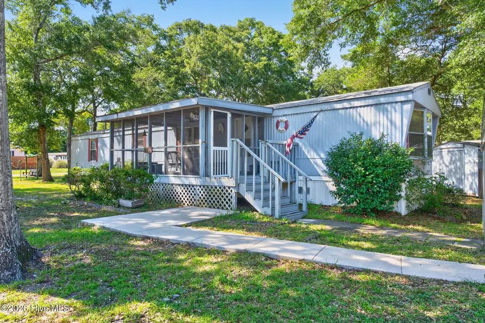 1649 Woodview Circle SW, Ocean Isle Beach, NC 28469 — 2-bedroom manufactured home, Ocean Isle Beach, NC, photo 1 of 55