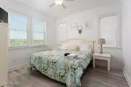 1324 New River Inlet Road, North Topsail Beach, NC 28460 — 5-bedroom waterfront townhome, North Topsail Beach, NC, photo 9 of 75: bedroom-01a