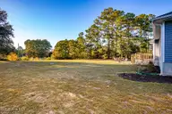 1108 Coral Reef Drive, New Bern, NC 28560 — 4-bedroom home in Fairfield Harbour, New Bern, NC, photo 6 of 33: Austin - new yard photo