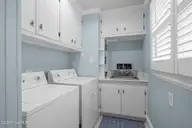 1207 Timber Trail, Emerald Isle, NC 28594 — 4-bedroom waterfront home, Emerald Isle, NC, photo 14 of 63: 1207 Timber Trail Laundry room