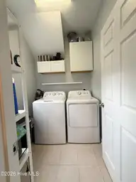 503 W Yacht Drive, Oak Island, NC 28465 — 4-bedroom home in Tranquil Harbor, Oak Island, NC, photo 12 of 53: laundry room