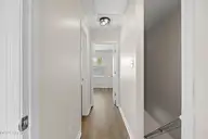 27 E Doris Avenue 111, Jacksonville, NC 28540 — 2-bedroom townhome in Doris Place, Jacksonville, NC, photo 16 of 29: 18_hallway