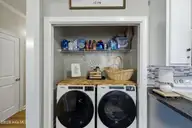 304 Sandy Knob Lane, Rocky Mount, NC 27803 — 3-bedroom home in Poplar Ridge, Rocky Mount, NC, photo 10 of 26: Laundry Closet