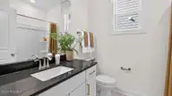 1016 Martin Farms Boulevard, Aberdeen, NC 28315 — 4-bedroom home in Martin Farms, Aberdeen, NC, photo 22 of 28: Bathroom
