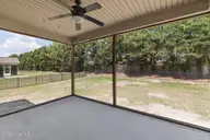 115 Christopher Allen Drive, Goldsboro, NC 27534 — 4-bedroom home in Glenda's Pointe, Goldsboro, NC, photo 23 of 47: Screened in Porch