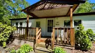 648 Old Church Road, Swansboro, NC 28584 — 3-bedroom manufactured home in Cedar Creek Est, Swansboro, NC, photo 20 of 37: covered front porch