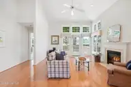 176 Starland Lane, Southern Pines, NC 28387 — 3-bedroom condo in Longleaf CC, Southern Pines, NC, photo 7 of 58: 03 - Living Room - Fireplace Lit