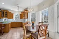 312 Lord Berkeley Drive, Emerald Isle, NC 28594 — 3-bedroom waterfront home in Royall Oaks, Emerald Isle, NC, photo 24 of 61: Eat-in Area of Kitchen