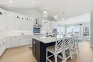 109 Ocean Bluff Drive, Indian Beach, NC 28512 — 6-bedroom waterfront home in Ocean Bluff, Indian Beach, NC, photo 11 of 57: Kitchen