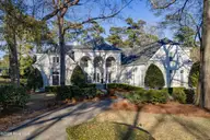 1520 Radian Road, Wilmington, NC 28405 — 4-bedroom home in Landfall, Wilmington, NC, photo 1 of 56: 003_dji_20260311095322_0291_d_copy_142