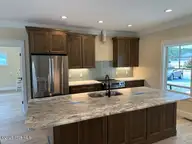 179 Erfie Drive S, Pinebluff, NC 28373 — 2-bedroom home in The Pines, Pinebluff, NC, photo 2 of 13: Kitchen 1
