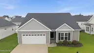 1701 Penncross Drive, Greenville, NC 27834 — 3-bedroom home in Meadow Woods, Greenville, NC, photo 1 of 47: 3-web-or-mls-DJI_20260629111045_0586_D