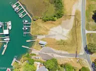 710 Hughes Road, Hampstead, NC 28443 — 4-bedroom waterfront home in Washington Acres, Hampstead, NC, photo 6 of 52: 049_710_hughes_road_drone_-8_255