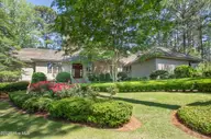 60 Woodenbridge Lane, Pinehurst, NC 28374 — 4-bedroom waterfront home in National, Pinehurst, NC, photo 1 of 76: FrontExterior1-2