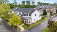 3907 Reunion Pointe Lane, New Bern, NC 28562 — 3-bedroom townhome in Carolina Colours, New Bern, NC, photo 11 of 37: 9-web-or-mls-DJI_20250820141742_0003_D