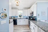 2201 E Beach Drive, Oak Island, NC 28465 — 5-bedroom waterfront home in East Beach, Oak Island, NC, photo 11 of 38