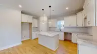 165 Devonshire Avenue W, West End, NC 27376 — 4-bedroom home in Seven Lakes South, West End, NC, photo 6 of 19: 165-W-Devonshire-Ave-Kitchen 1
