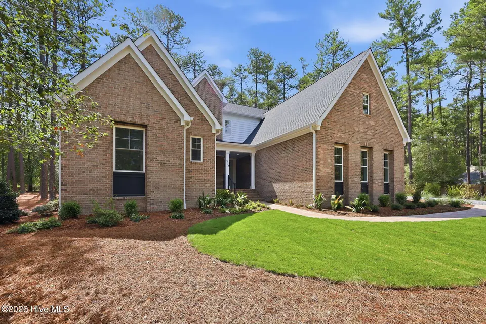 43a Pinewild Drive, Pinehurst, NC 28374 — 4-bedroom home in Pinewild CC, Pinehurst, NC, photo 1 of 57: 52-web-or-mls-IMG_2727