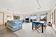 1308 Ocean Drive, Emerald Isle, NC 28594 — 4-bedroom waterfront home in Emerald Isle By The Sea, Emerald Isle, NC, photo 15 of 51: Living/dining