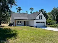 1996 E Boiling Spring Road, Southport, NC 28461 — 3-bedroom home in Boiling Spring Lakes, Southport, NC, photo 1 of 42: Front 2