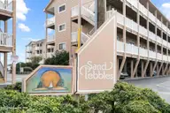 1101 S Lake Park Boulevard S Unit A19, Carolina Beach, NC 28428 — 2-bedroom condo in Sand Pebbles Condominium, Carolina Beach, NC, photo 1 of 26: 0-web-or-mls-1101-lake-park-blvd-s