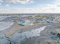 1206 Pinnacle Court, Morehead City, NC 28557 — 5-bedroom waterfront home in Pinnacle Pointe, Morehead City, NC, photo 1 of 73: 01-DJI_20260223160431