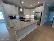 117 Flat Clam Drive, Wilmington, NC 28401 — 3-bedroom home in Riverside Cove, Wilmington, NC, photo 11 of 28: Kitchen