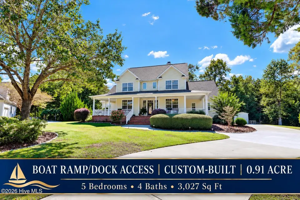 134 Wild Berry Lane, Hampstead, NC 28443 — 5-bedroom waterfront home in Bent Tree, Hampstead, NC, photo 1 of 46: 134 Wild Berry
