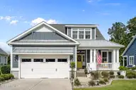 222 Twining Rose Lane, Holly Ridge, NC 28445 — 4-bedroom waterfront home in Summerhouse On Everett Bay, Holly Ridge, NC, photo 1 of 62: Front Elevation