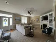 6725 Hemlock Court, Sims, NC 27880 — 4-bedroom home in Magnolia Place, Sims, NC, photo 13 of 58: gas logs/bookcases