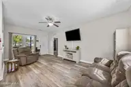 1003 Humphrey Road, Jacksonville, NC 28540 — 4-bedroom home in Georges Corner, Jacksonville, NC, photo 5 of 28: 1003 Humphrey Road Living Room 2