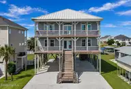 9091 W 9th Street, Surf City, NC 28445 — 4-bedroom waterfront home in Old Settlers Beach, Surf City, NC, photo 1 of 71
