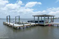 601 New River Inlet Road, North Topsail Beach, NC 28460 — 8-bedroom waterfront home in Sea Dunes Village, North Topsail Beach, NC, photo 13 of 71: 601 New River Inlet Road - Aerial - Edit