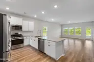 8850 Baton Rouge Avenue NW, Calabash, NC 28467 — 5-bedroom home in Brunswick Plantation, Calabash, NC, photo 7 of 58: Kitchen-Open Living Space